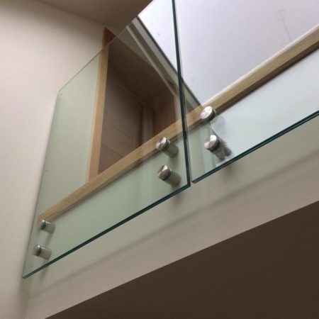 mezzanine infinity glass balustrades - Sunrock Balconies